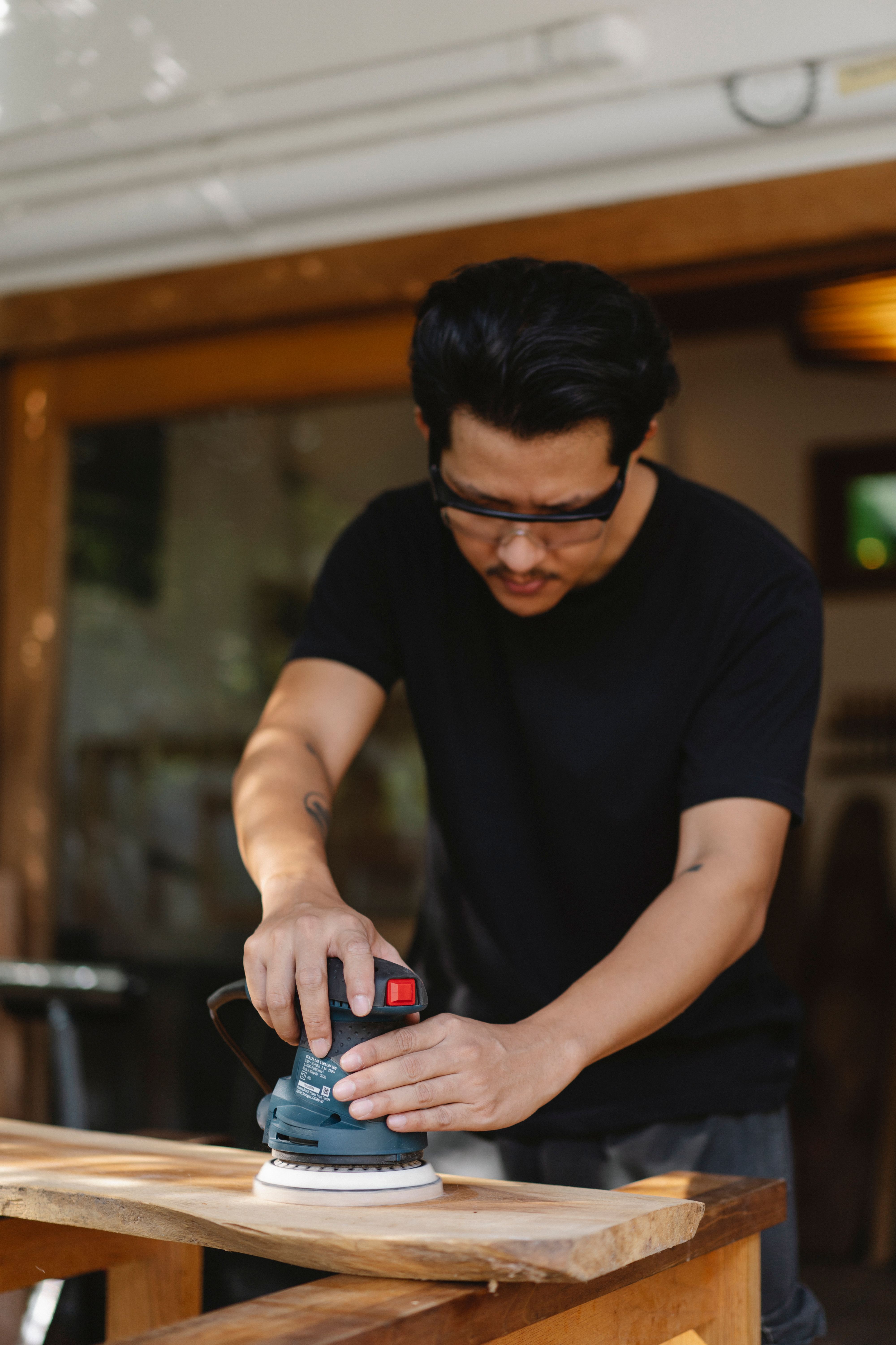 John Roberts performing a home repair in Pensacola